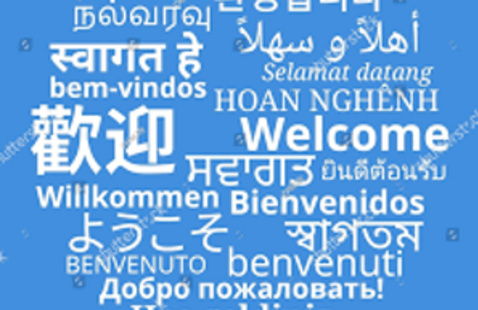 Blue background with the word welcome in multiple languages.