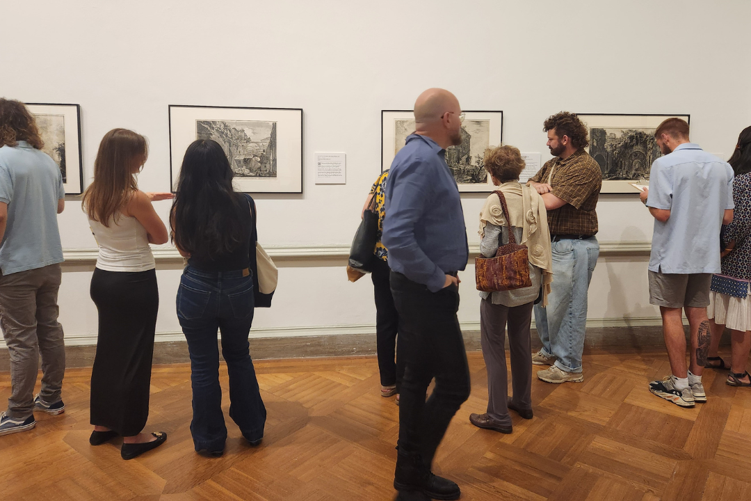 GW Students and Faculty admire the art of Piranesi at the exhibition opening.