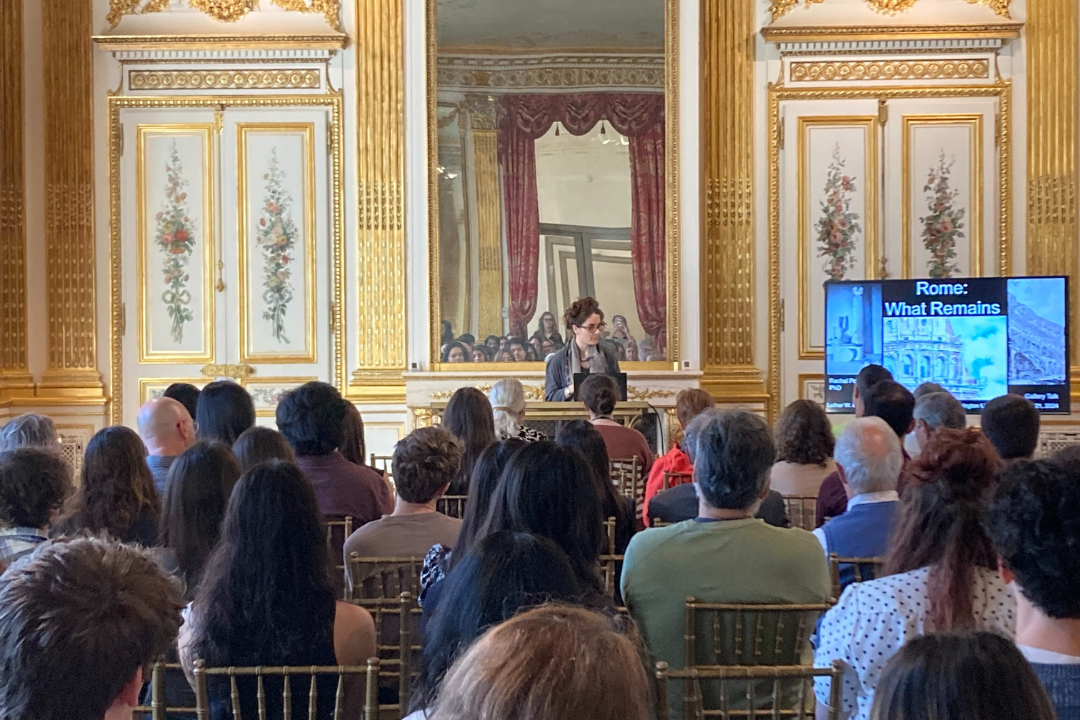 Dr. Rachel Pollack addressing the audience in the Salon Doré at the Pop-Up Exhibition Opening.