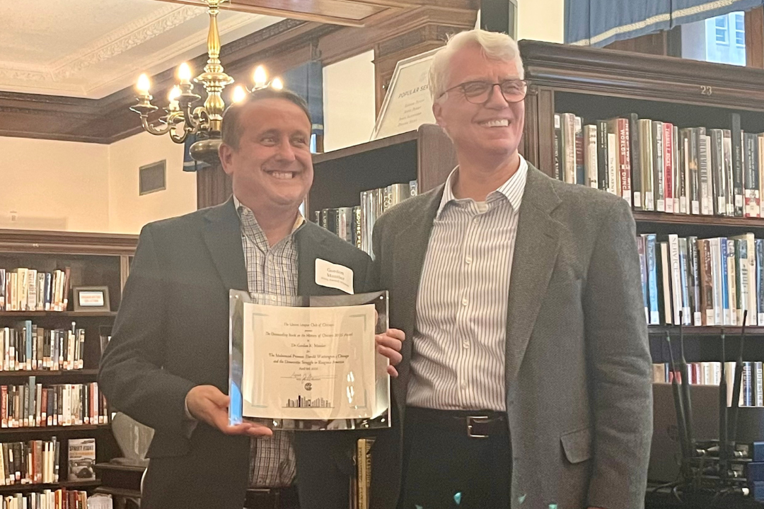 Left to right, Gordon Mantler receiving award; David Burrus, ULCC board member and chair of the library, history & archives subcommittee.