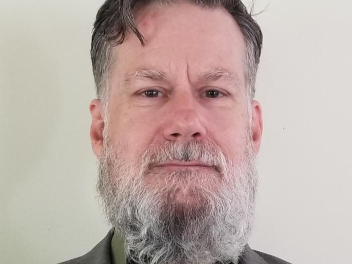 Headshot of Mark Mullen.